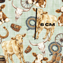 Load image into Gallery viewer, Cows on green linen
