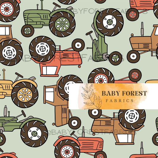 Farm tractors on green