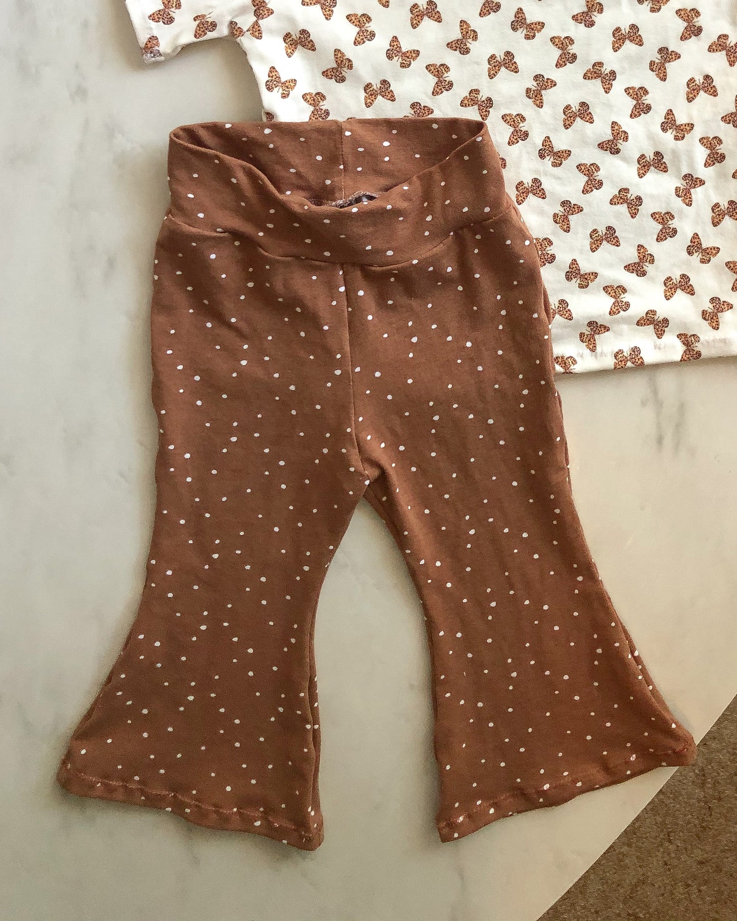 Brown spot flare pants